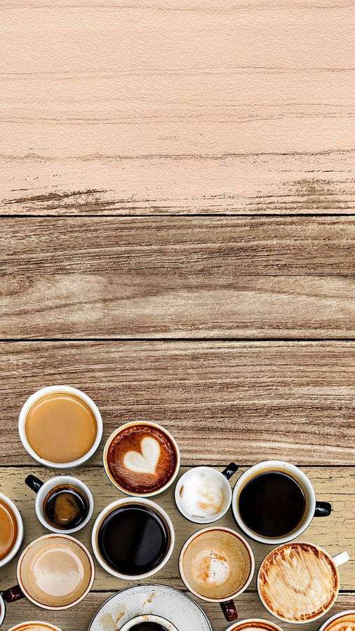 Various coffee cups with latte art arranged on a wooden surface. — Coffee Aesthetic Wallpaper