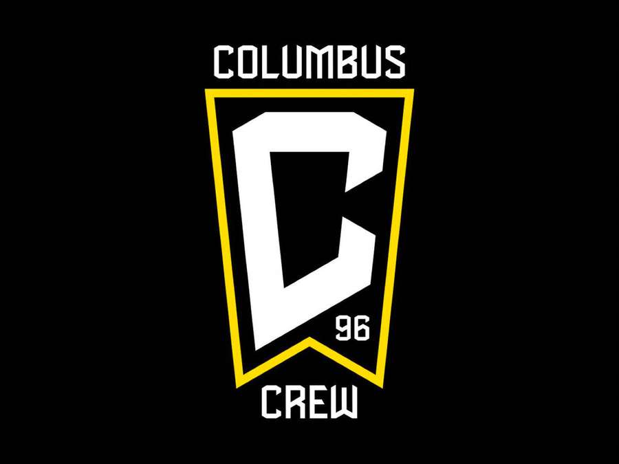 Columbus Crew sports team logo with bold white and yellow design on black. — Columbus Crew Background