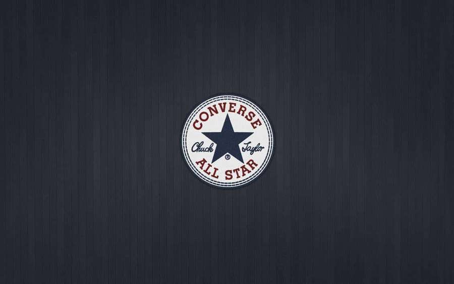 Converse All Star logo on dark wood texture background — Converse Logo Background