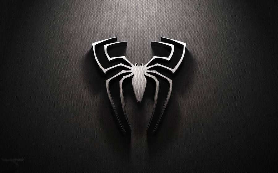 Venom logo on black textured wall with dramatic lighting and shadow. — Cool Logos Wallpaper