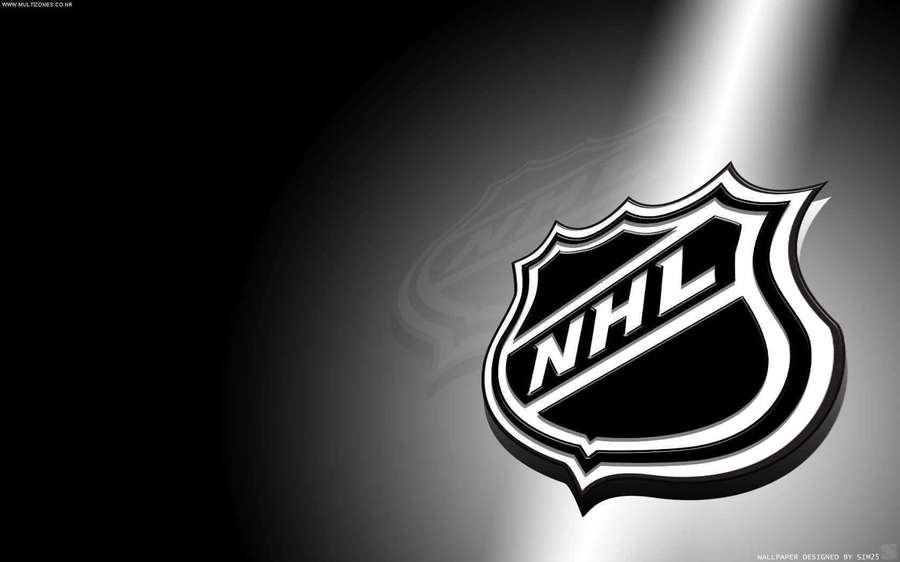 Logotipo da NHL destacado por um holofote em um fundo escuro. — Cool NHL Papéis de Parede