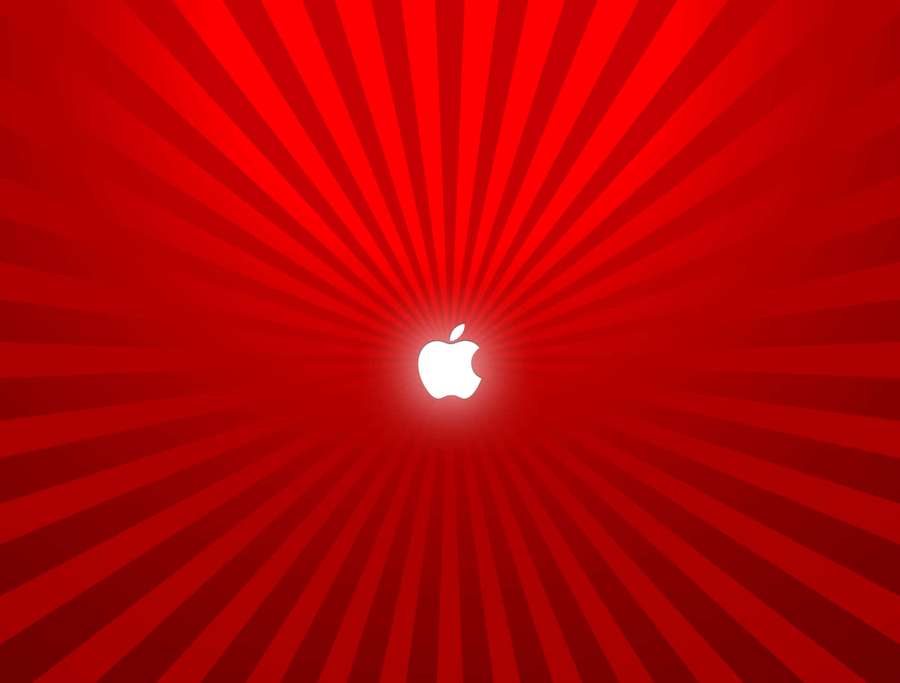 Valkoinen Apple-logo keskitetty punaiseen auringonsäde-kuvioon — Cool Punainen Taustakuvat
