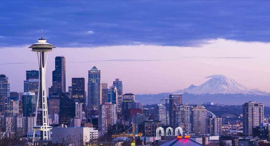 Seattle skyline with Space Needle and Mount Rainier at twilight. — Cool Seattle Wallpaper