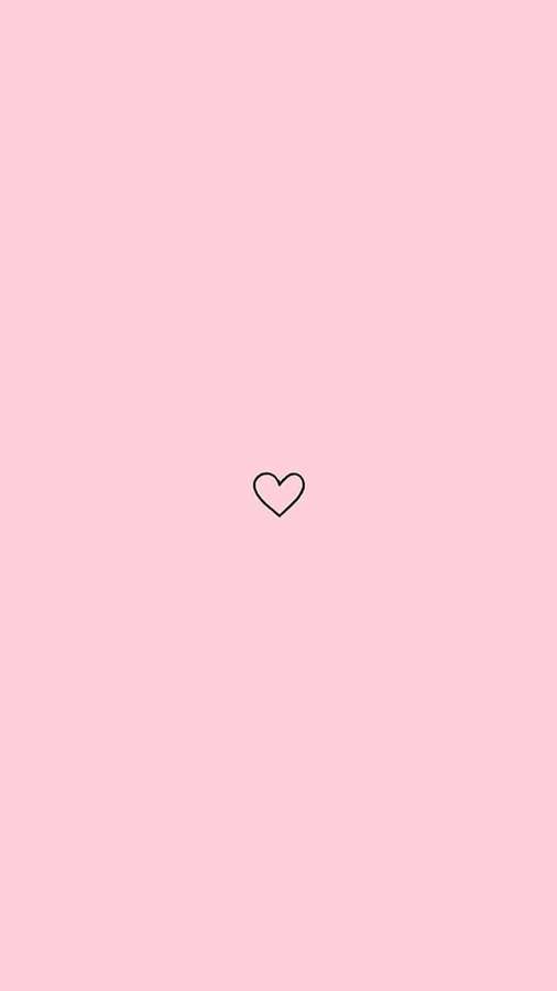 Un pequeño corazón negro sobre un fondo rosa. — Corazón iPhone Fondos de pantalla