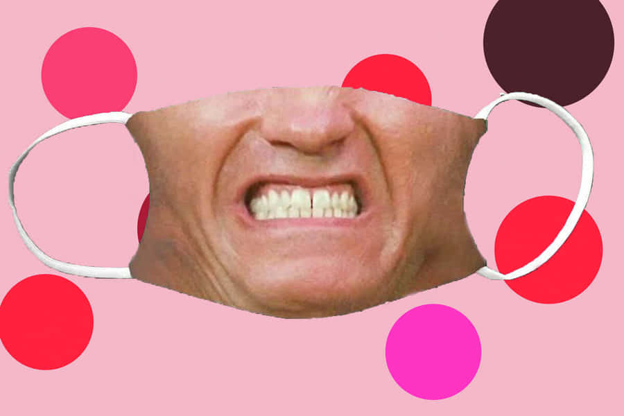 Um rosto zangado em uma máscara facial cercado por bolinhas coloridas. — Cringe Papéis de Parede