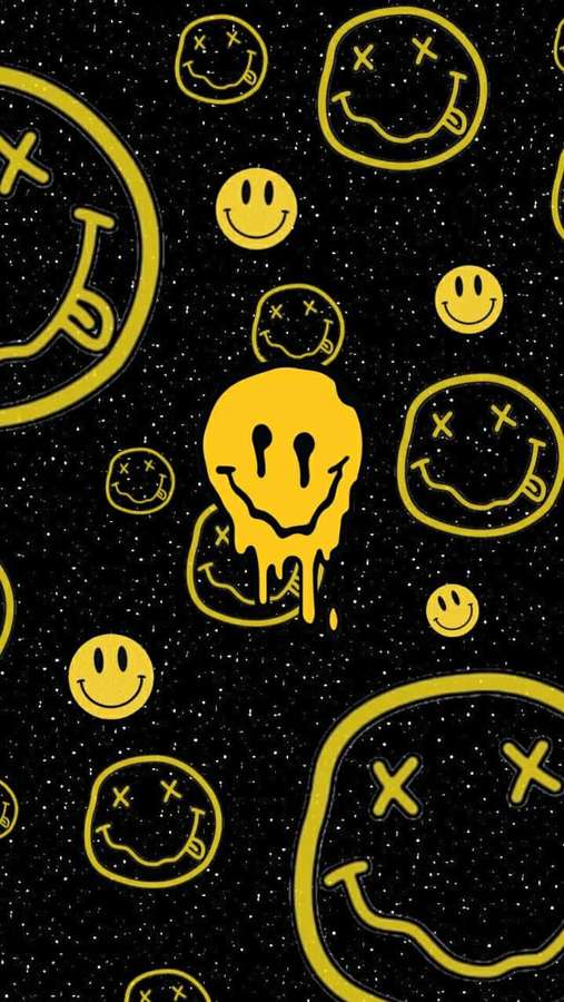 Yellow smiley faces with X eyes and dripping paint on a black speckled background. — Cute Gothic Wallpaper
