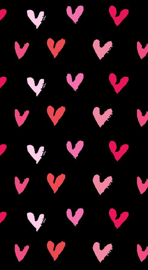 Pattern of pink and red brushstroke hearts on black background. — Cute Valentines Background