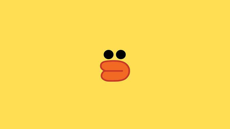 A simple orange duck face with black eyes on a yellow background. — Cute Yellow Desktop Wallpaper