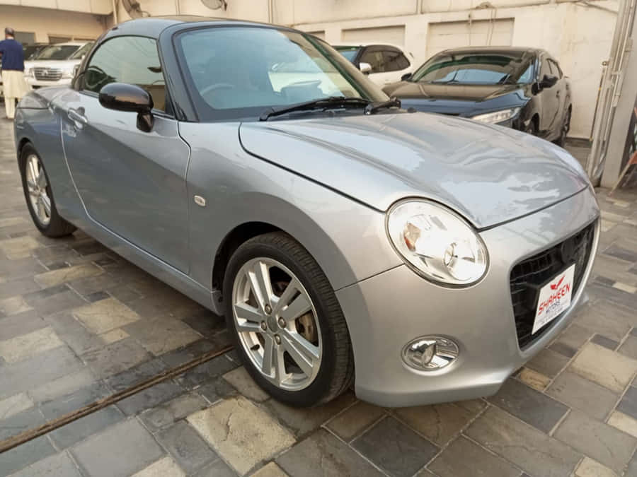 Daihatsu Copen Achtergrond