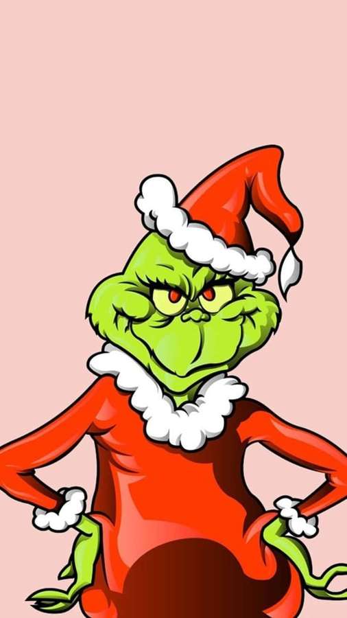 Grinch in rotem Weihnachtsmannoutfit mit weißem Besatz und Hut, die Hände in den Hüften. — Der Grinch Wallpaper