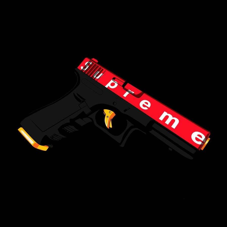 Schwarze Pistole mit rotem Supreme-Schlitten und goldenen Akzenten auf schwarzem Hintergrund. — Dope Supreme Bilder