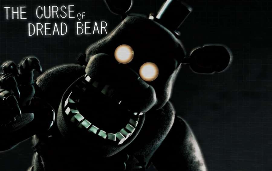A scary animatronic bear with glowing eyes and sharp teeth in a dark setting. — Dreadbear Wallpaper