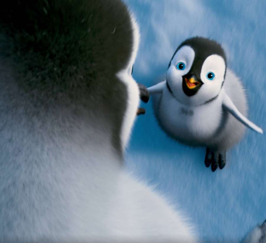 A baby penguin with blue eyes reaches toward an adult penguin in a snowy scene. — Erik Background
