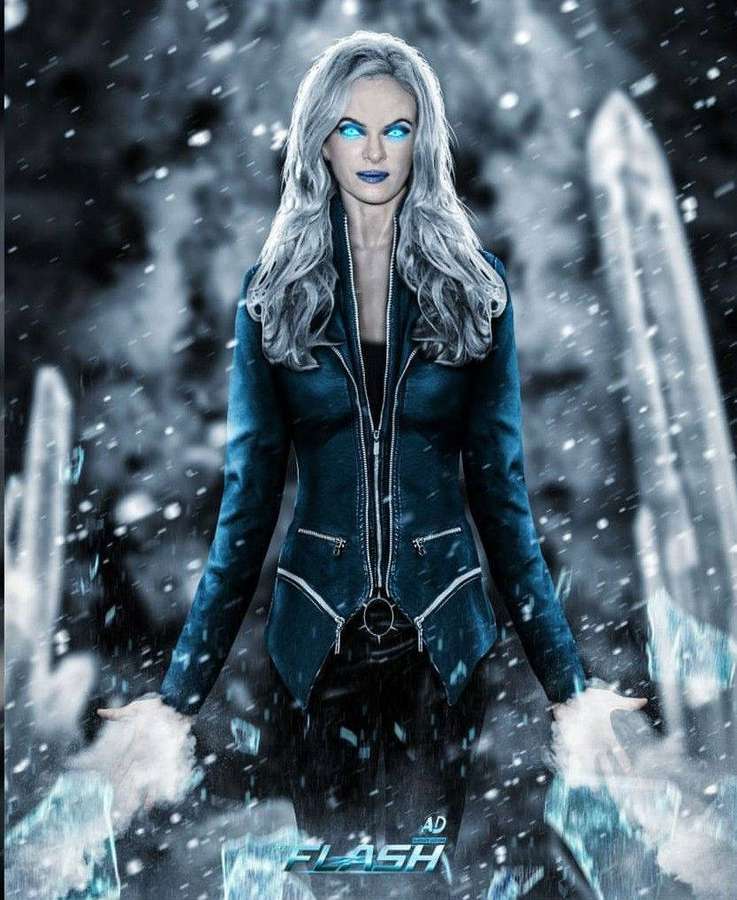 Una superhéroe con ojos azules brillantes crea hielo en un paisaje nevado. — Escarcha Fondos de pantalla