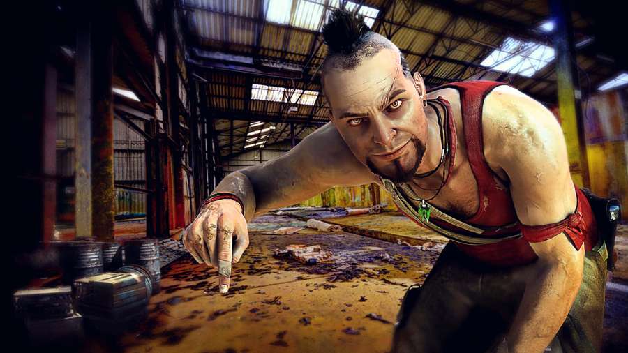 A muscular man with a mohawk leans forward in a dirty warehouse, finger pointed at viewer. — Far Cry 3 Background