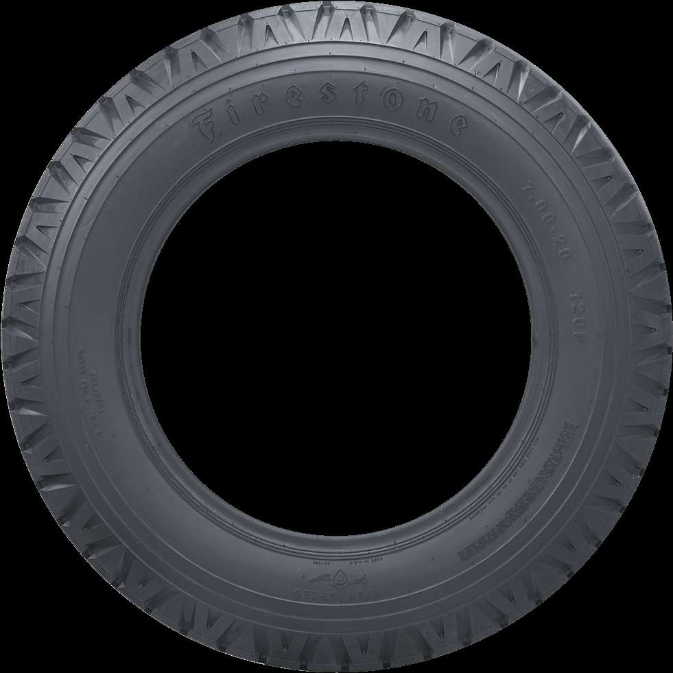 Gray Firestone tire with visible tread and specifications against black background. — Firestone Background