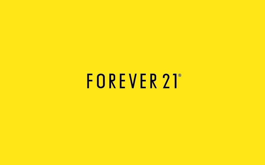 Forever 21 brand logo in black text on yellow background — Forever 21 Wallpaper