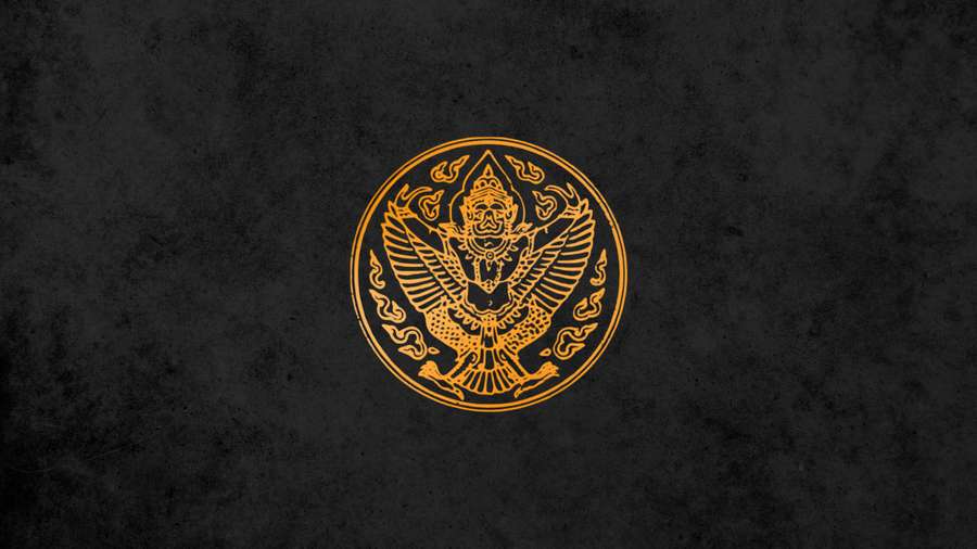 Golden Garuda emblem on dark textured background — Garuda Background