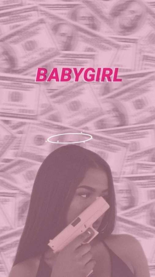 Woman with halo holding pink gun against pink money background. — Girly Money Wallpaper