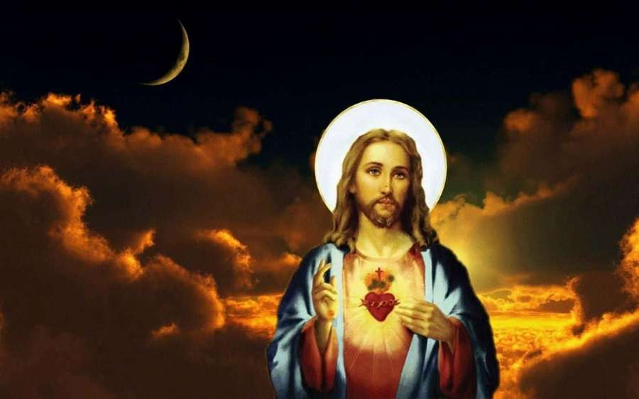 Jesus Christ with halo and sacred heart against fiery clouds and crescent moon. — God Jesus Wallpaper