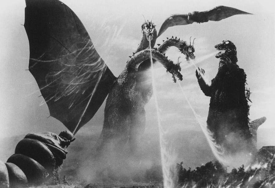Godzilla vecht tegen een driehoofdige draak in een klassieke monsterfilm scène. — Godzilla Vs Rodan Achtergronden