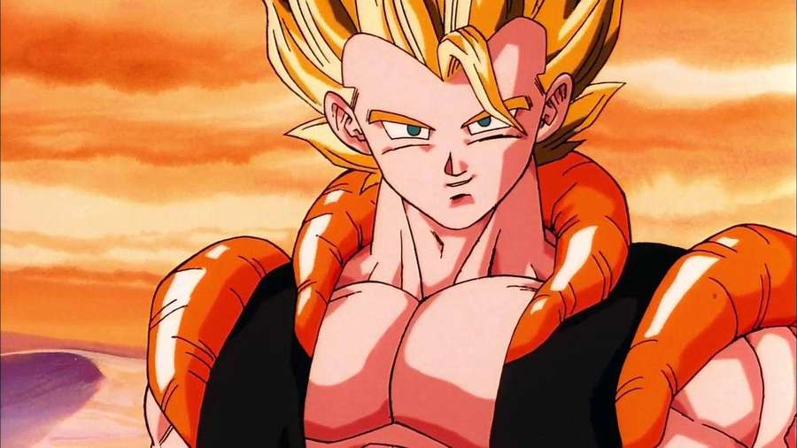 Anime-Held mit goldenen Haaren und orangefarbenem Gi vor orangefarbenem Sonnenuntergangshimmel. — Gogeta Bilder