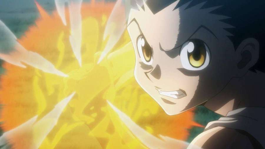 Anime character firing a fiery energy blast with fierce expression — Gon Freecss Wallpaper