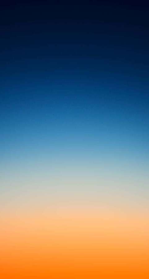 Gradienthimmel som går fra blå til oransje ved solnedgang — Gradient iPhone Bakgrunner