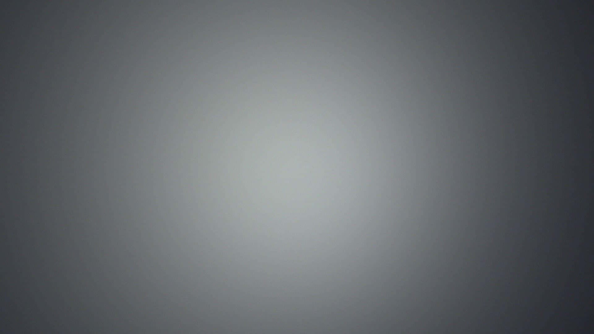 Soft gray gradient background for digital use.