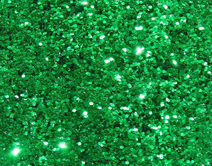 Close-up of bright green glitter with sparkling highlights. — Green Glitter Background