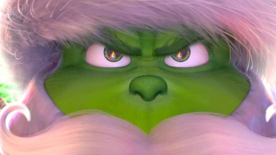 Grinchs wütendes Gesicht mit glühenden Augen und weißem Pelzbesatz — Grinch Bilder