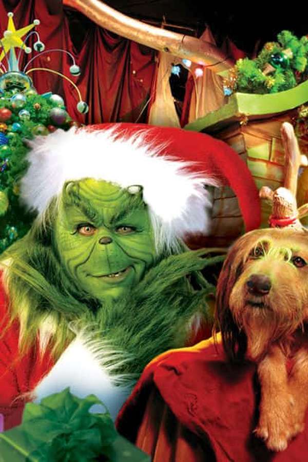 Grinch og hund i julemiljø med pynt og lys. — Grinch Christmas iPhone Wallpapers