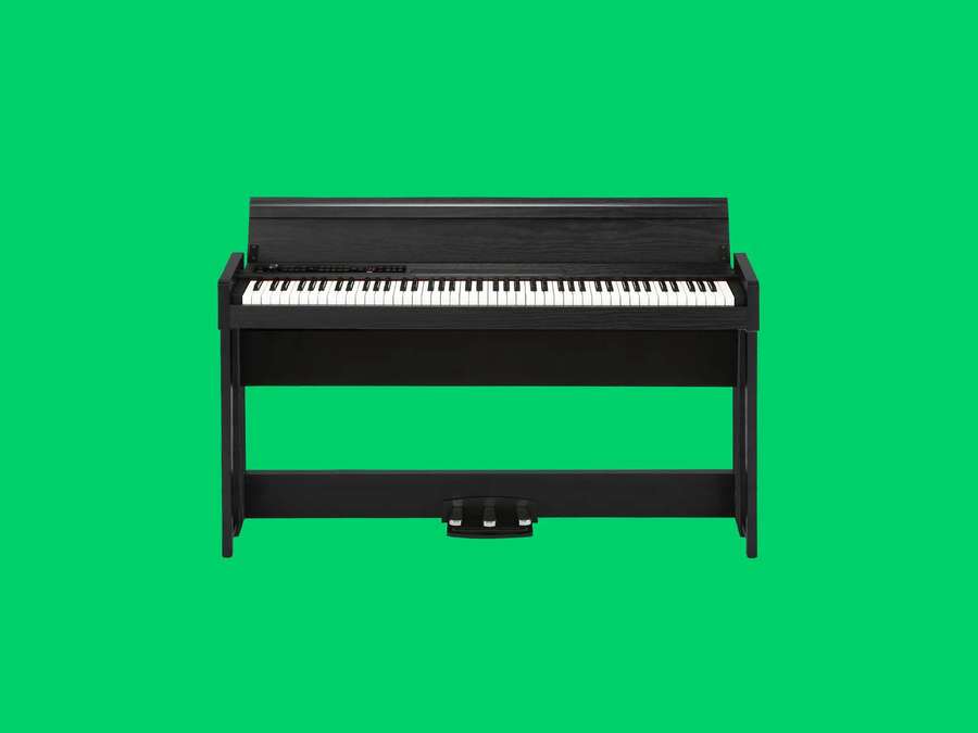 Schwarzes Digitalpiano mit weißen Tasten auf grünem Hintergrund. — Grüner Bildschirm Wallpaper