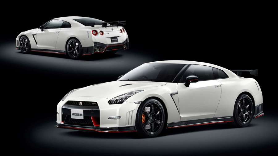 Two white Nissan GT-R sports cars with black and red accents in a studio setting. — Gtr Background