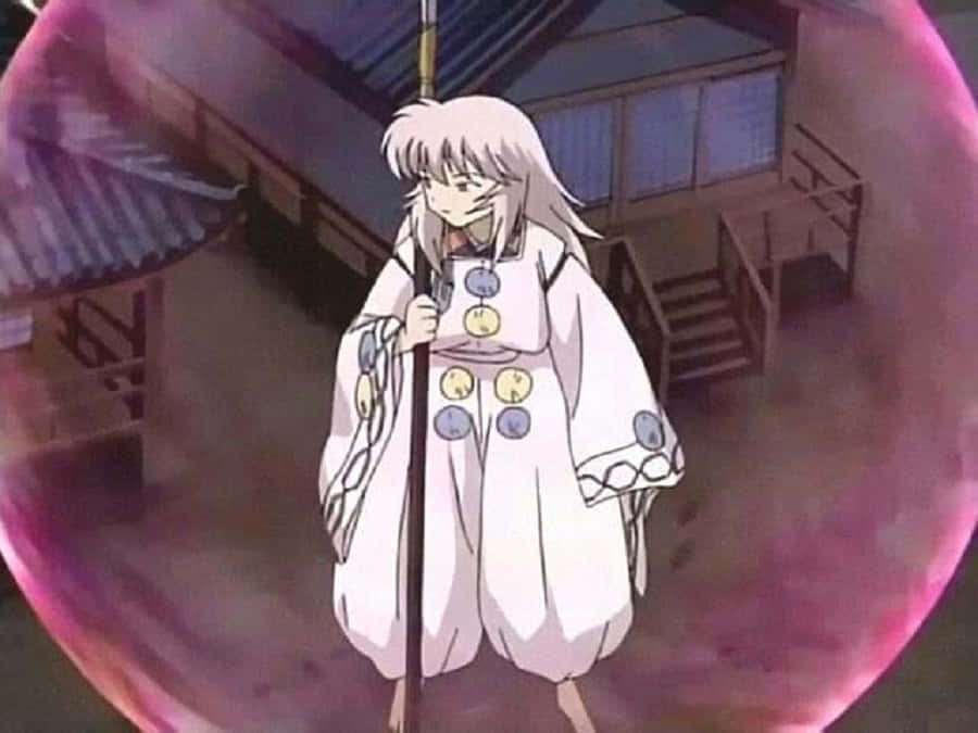 Anime character in white robe holding staff inside pink energy sphere over wooden building. — Hakudoshi Wallpaper