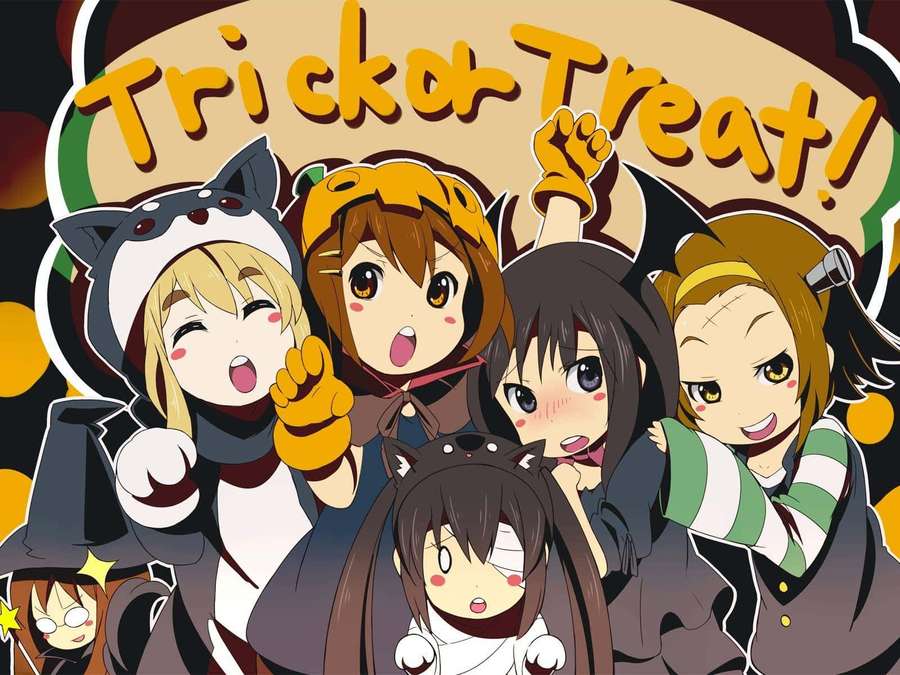 Five anime girls in Halloween costumes smiling and posing for trick or treat. — Halloween Treats Background