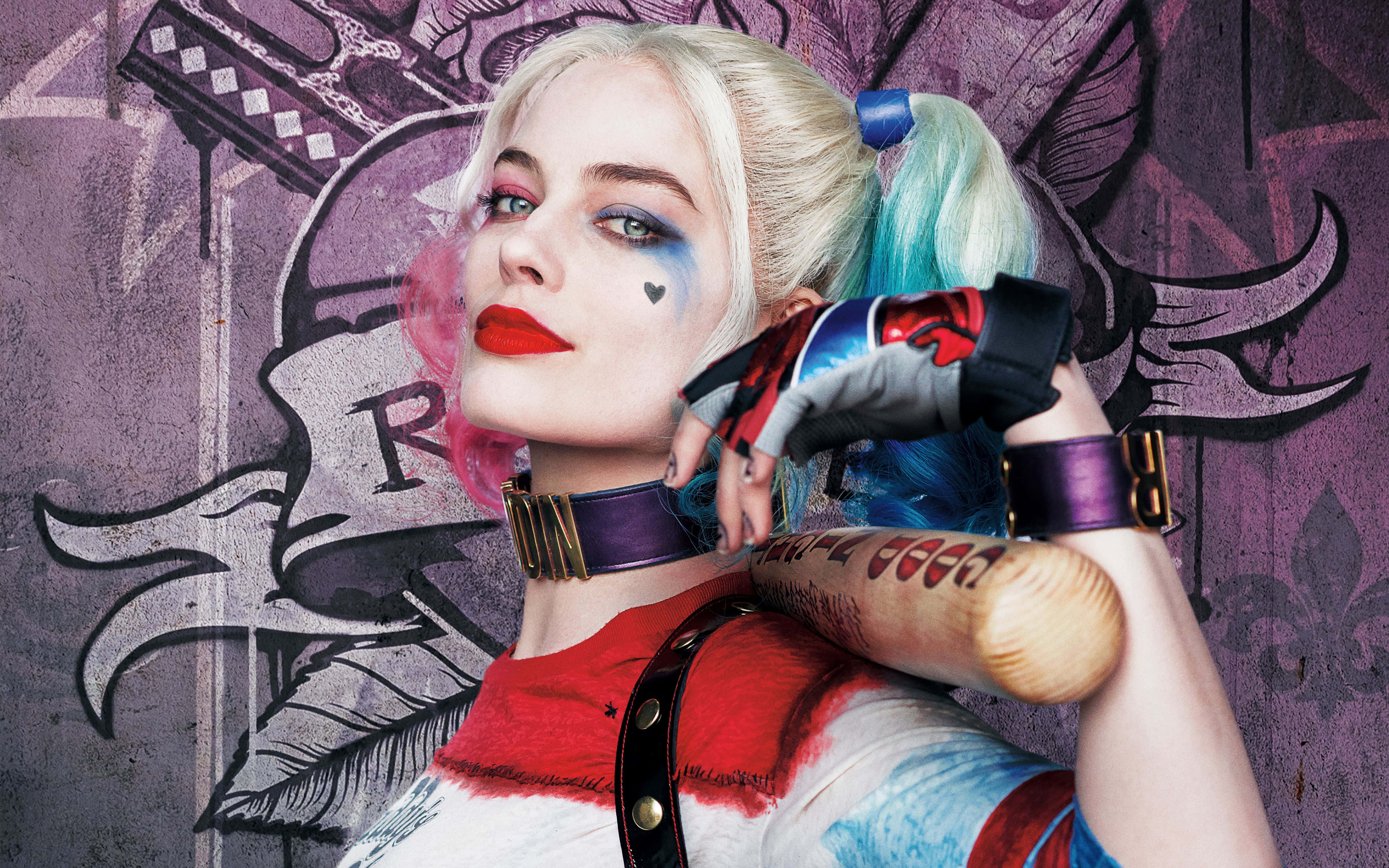 Harley Quinn holding a baseball bat against a graffiti wall. — Harley Background