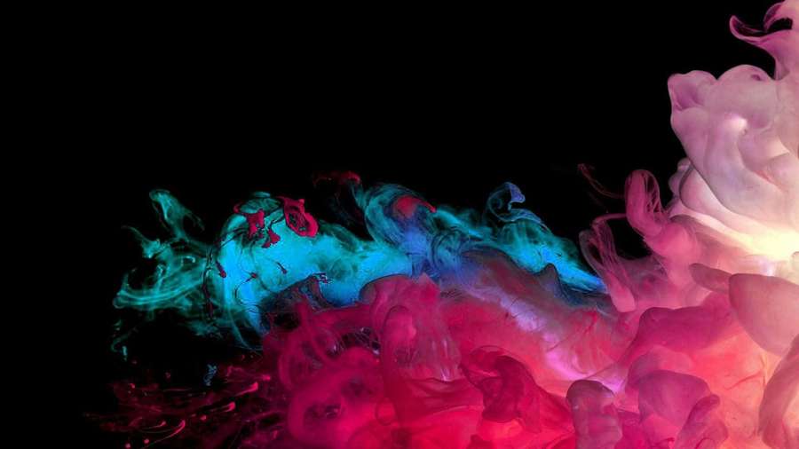 Abstract colorful ink swirls floating in dark water — HD Amoled Picture