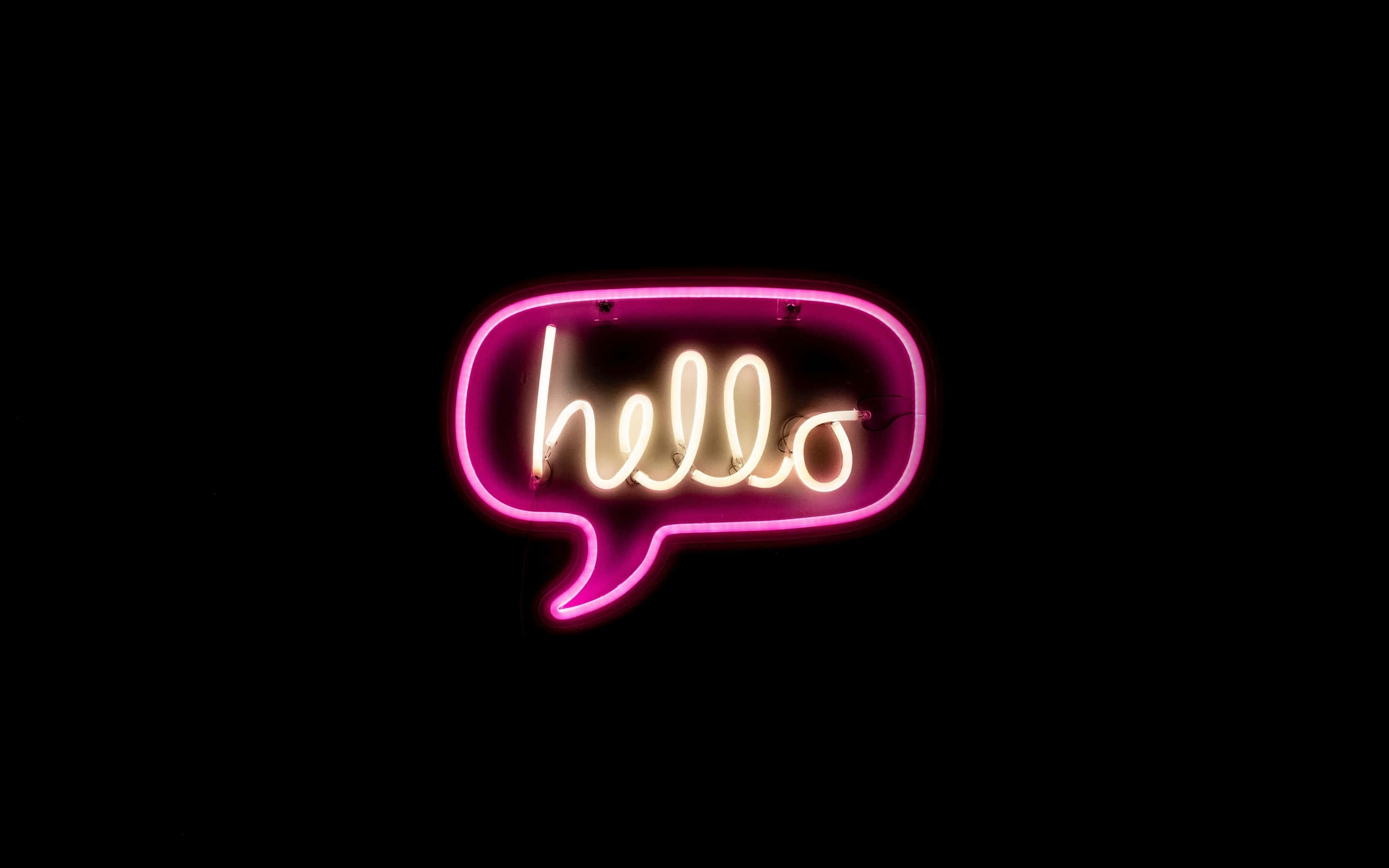 Rosa neonpratbubbla med hello-text som lyser mot svart bakgrund. — Hello Bakgrundsbilder