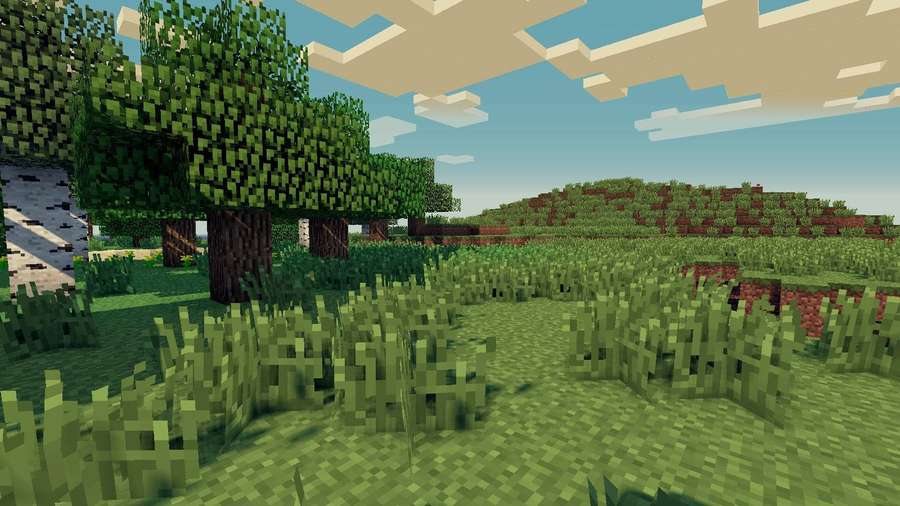 Bosque pixelado de Minecraft con árboles y hierba bajo un cielo en bloques. — Hermoso Minecraft Fondos de pantalla