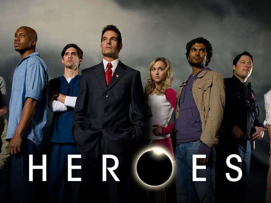 Six actors from the TV show Heroes stand in a line against a dark stormy background. — Heroes Background
