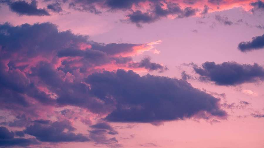 Pink and purple clouds glowing at dusk — High Resolution Clouds Wallpaper