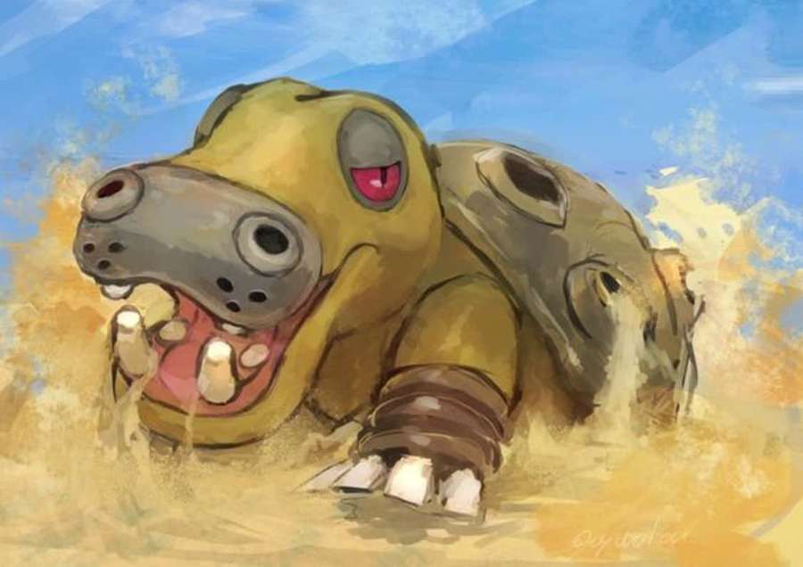 Yellow armored hippo creature charging through sand with red eyes. — Hippowdon Wallpaper