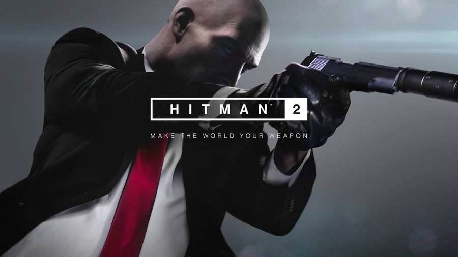 Hitman 2 game cover featuring a bald assassin in a suit aiming a silenced pistol. — Hitman 2 Wallpaper