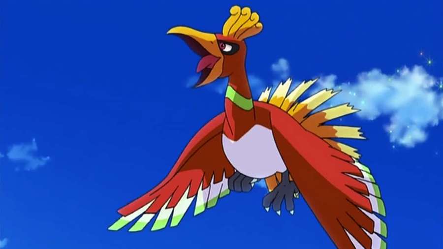 A red and white bird Pokémon flying in a blue sky with clouds and sparkles. — Ho-oh Wallpaper
