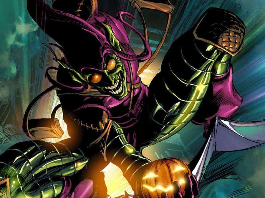 A green-skinned witch in purple robes holds a glowing jack-o-lantern. — Hobgoblin Wallpaper