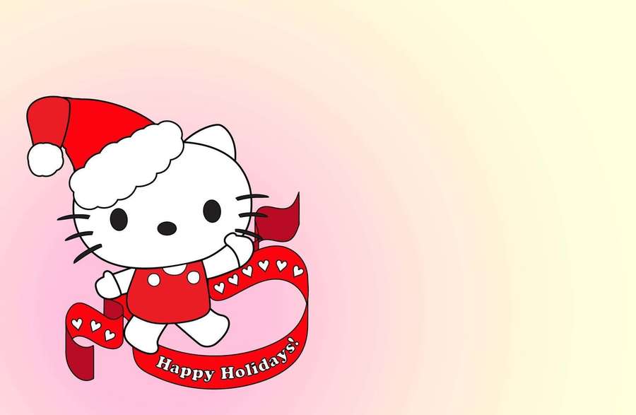 Hello Kitty con gorro de Santa sosteniendo una cinta navideña. — Hola Kitty Navidad Fondos de pantalla