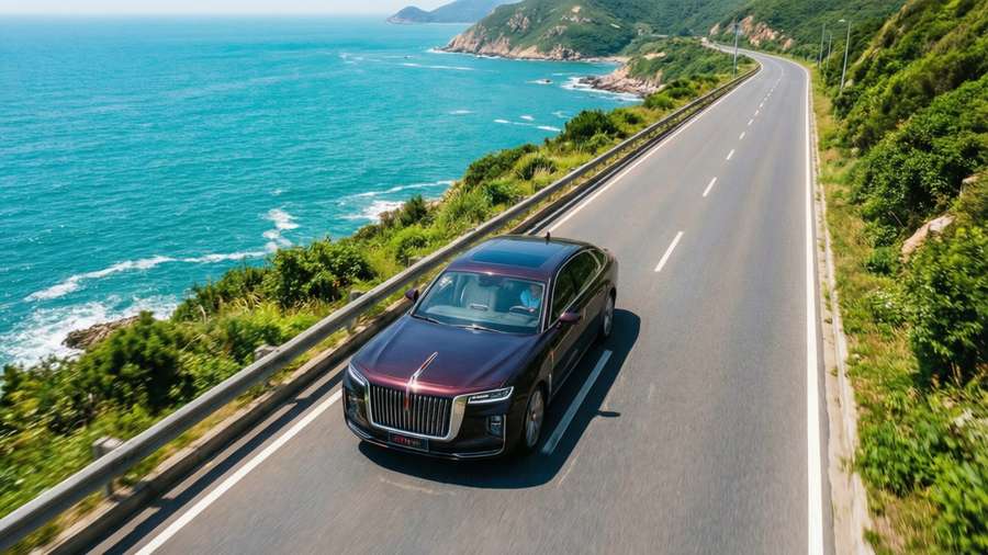 Aerial view of Hongqi L5 on coastal highway — Hongqi L5 Wallpaper