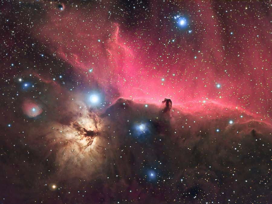 Vibrant pink and blue nebula with glowing stars in deep space. — Horsehead Nebula Wallpaper