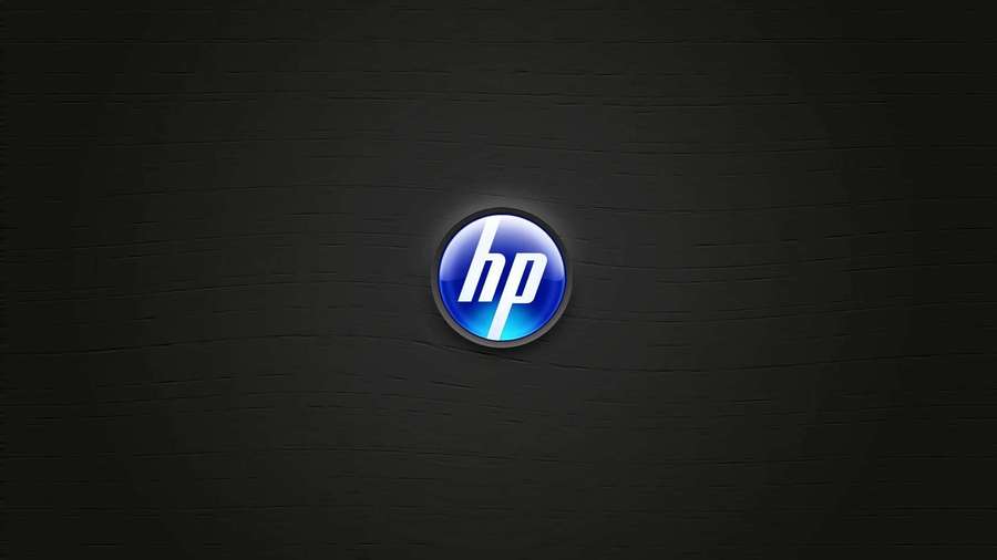 Glowing blue HP logo on dark textured wall — Hp Background